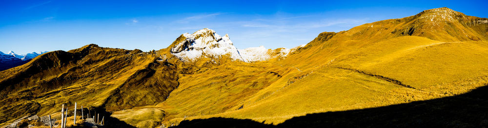 Scenic view of rocky mountains against sky