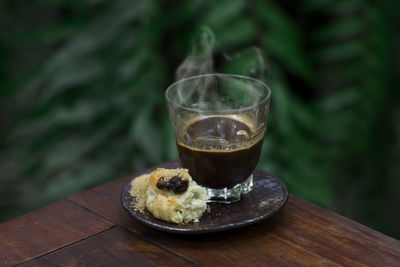 Close-up of coffee cup on table