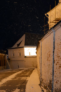 Houses in town against sky