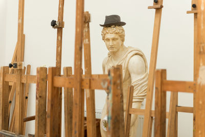 Man working on wood at construction site