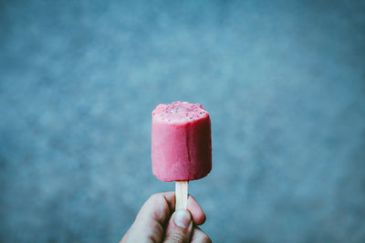 Hand holding ice cream cone