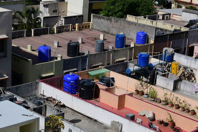 High angle view of people on street amidst buildings