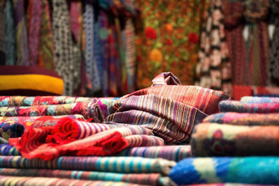 Multi colored scarves for sale at market stall