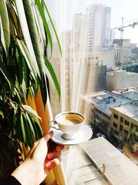 Man holding coffee cup