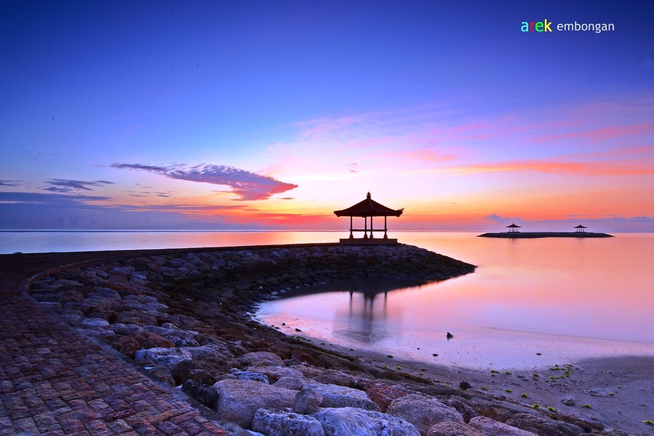 water, sea, sunset, horizon over water, sky, scenics, beach, orange color, beauty in nature, tranquil scene, tranquility, shore, idyllic, reflection, nature, transportation, travel, tourism, blue, incidental people