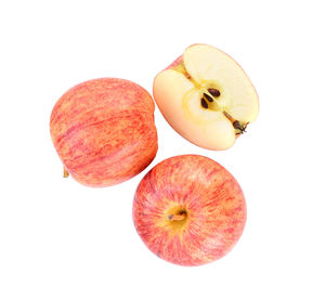 High angle view of apples on white background