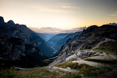 Scenic view of mountains against sky during sunset