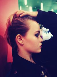 Portrait of young woman looking away