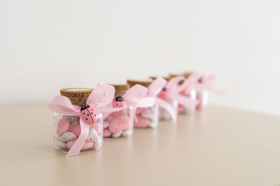 Close-up of small objects on table against white background