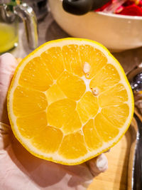 Close-up of orange slices on table