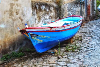 Boat moored on shore