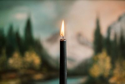 Close-up of burning candle