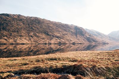 Scenic view of mountains against clear sky