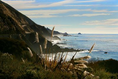 View of calm beach against the sky