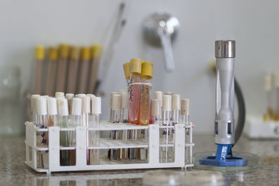 Close-up of bottles against white background