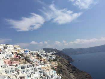 High angle view of city against cloudy sky