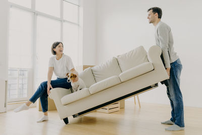 Couple on sofa at home