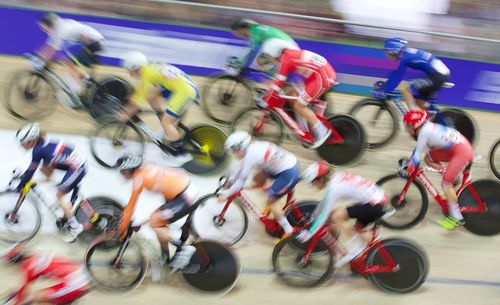 Group of people riding bicycle