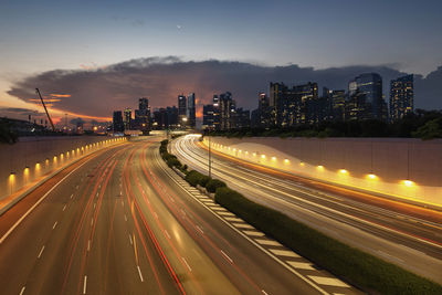 High angle view of light trails on road at night