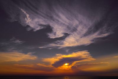 Low angle view of dramatic sky during sunset