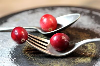 Close-up of strawberries in plate on table