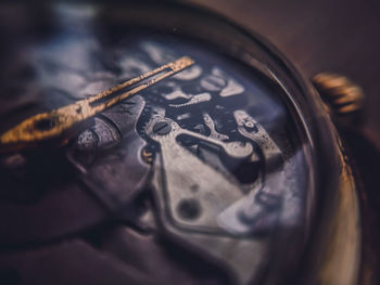 High angle view of clock on metal