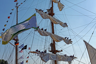 Low angle view of flag against sky