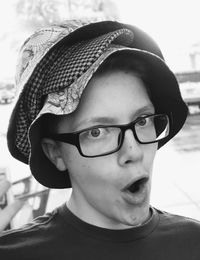 Close-up portrait of boy wearing hat