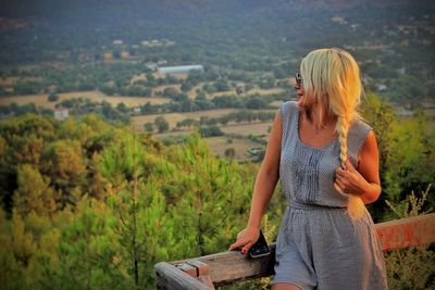 Woman standing in a beautiful landscape