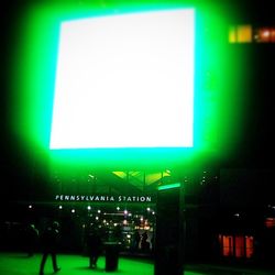 View of illuminated people at night