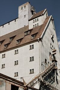 Low angle view of old building against sky