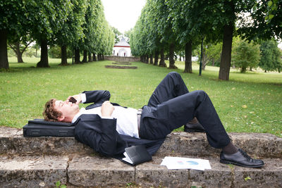Businessman relaxing in the park during his lunch break