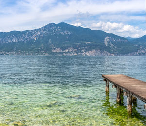 Scenic view of lake against sky at italy