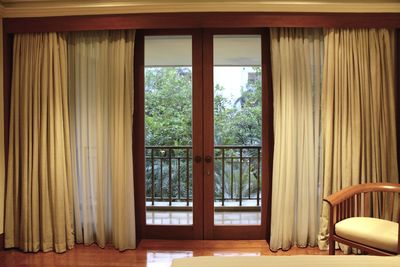 Trees seen through home window