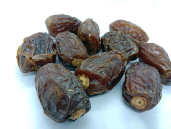 Close-up of fruits against white background