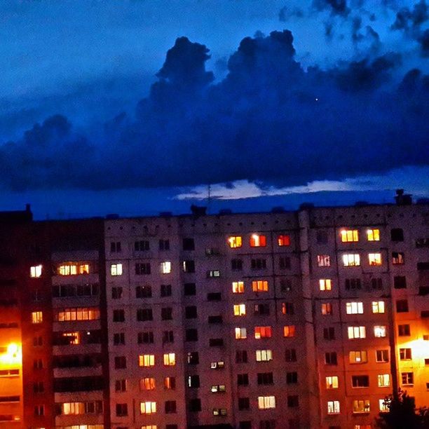 building exterior, architecture, built structure, city, sky, illuminated, residential building, cloud - sky, residential structure, low angle view, residential district, building, night, cityscape, dusk, cloud, sunset, cloudy, outdoors, window