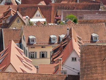 Houses in town against sky