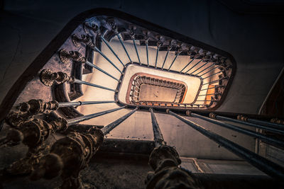 Directly below shot of spiral staircase of abandoned building