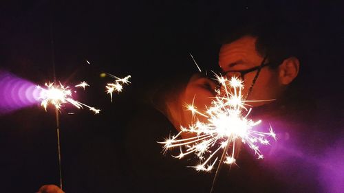 Firework display at night