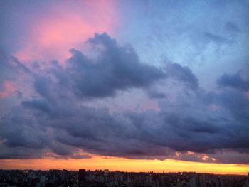 Scenic view of dramatic sky during sunset