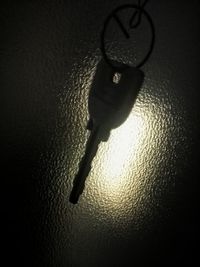 High angle view of black hanging on wall at home