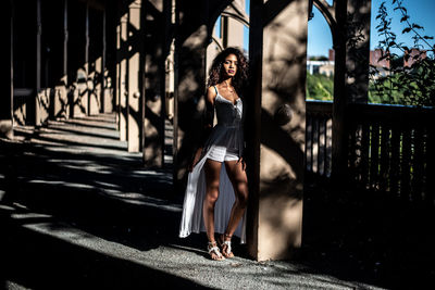 Full length of woman standing in park