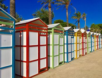 Built structure on beach against clear blue sky