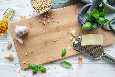 Ingredient for pesto sauce - fresh basil, pine nuts, olive oil and cheese