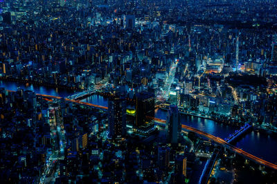 High angle view of illuminated cityscape