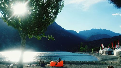 Sun shining over lake