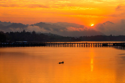 Mon bridge is the long wooden bridge. attanusorn bridge. sangkhla buri, kanchanaburi, thailand.