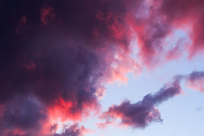 Low angle view of dramatic sky during sunset