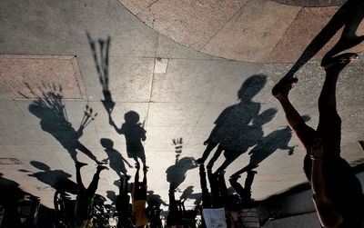 Shadow of people on wall