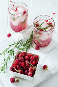 Close-up of strawberries in glass on table